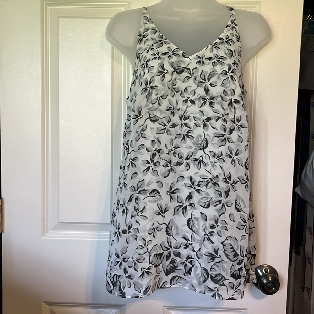 Cabi XS top. Sleeveless. With back ruffle detail. Adjustable straps
